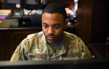 Soldier working at computer